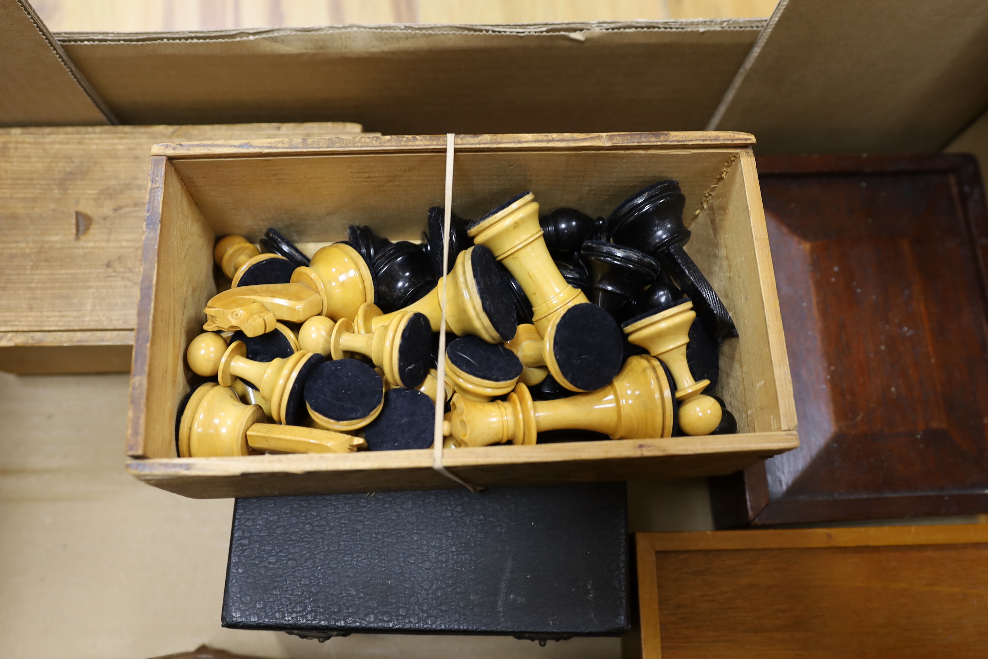 A collection of chess sets (six boxed) and one set of draughts, two boxes marked Jaques